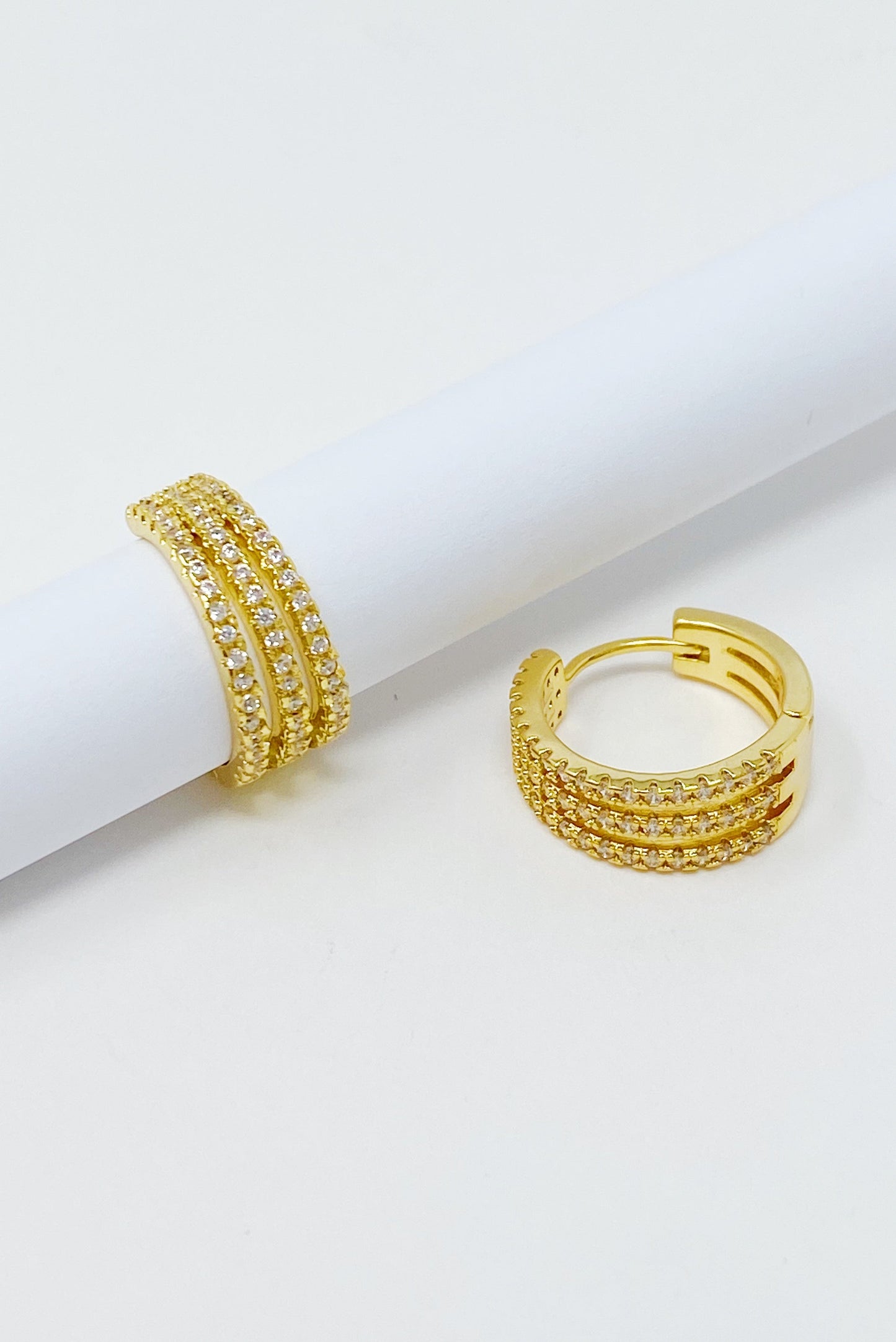 Triple Shine Huggie Earrings by Ellisonyoung.com