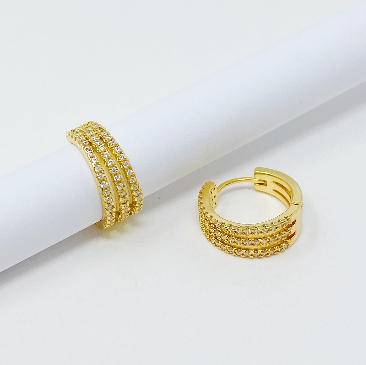 Triple Shine Huggie Earrings by Ellisonyoung.com